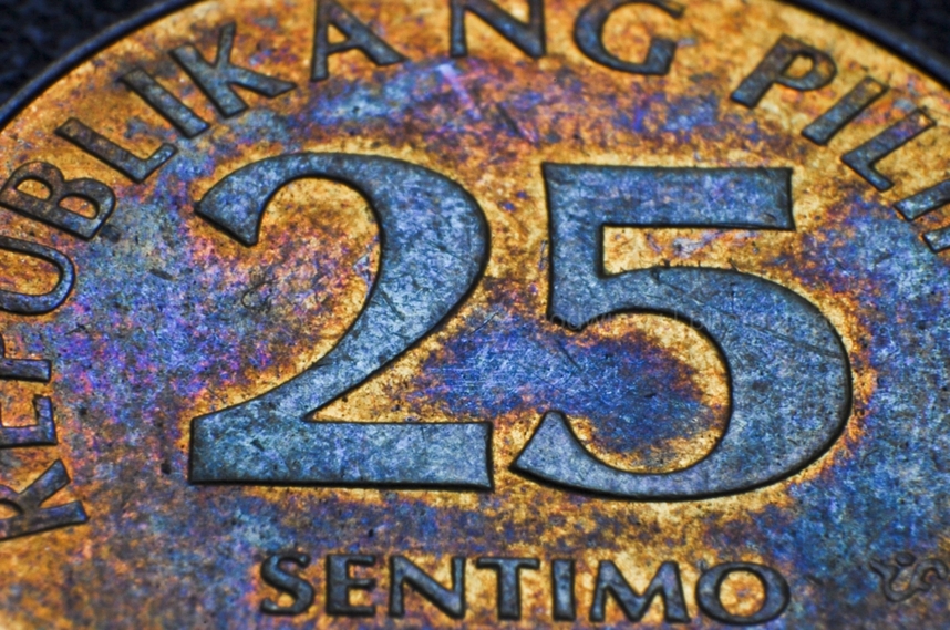 Old 25 Sentimo Coin. Money For the Rest of Us episode "what is money." Photo by Godwinn