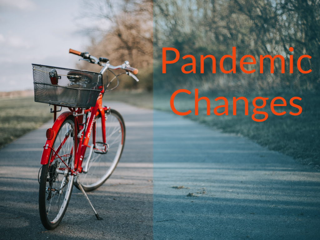 Red bike with a basket sitting on a paved trail. Caption says "Pandemic Changes."