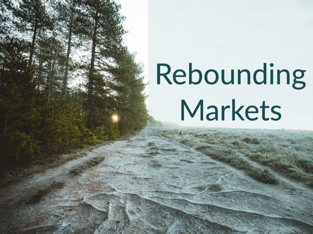 Edge of a forest. Text says "Rebounding Markets."