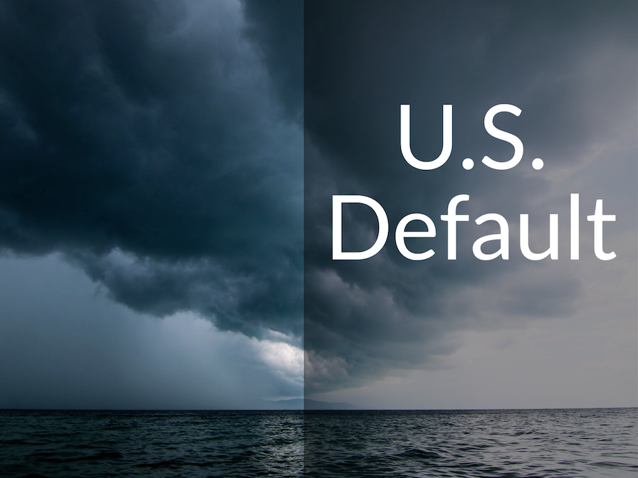 Storm clouds over the ocean. Caption says "U.S. Default"