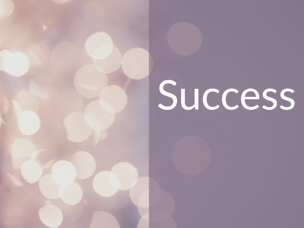 Cheerful looking lights with caption saying "Success"