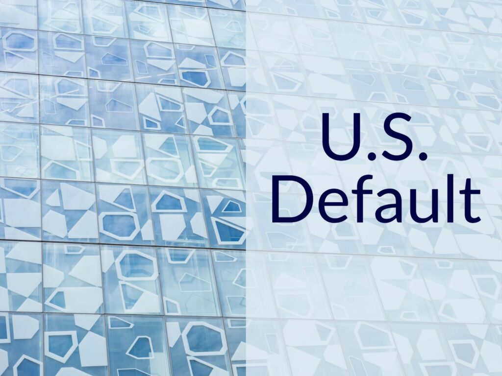 Beuituful glass with building with caption "U.S. Default"